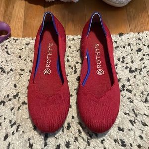 Rothy’s round toe flats in Scooter Red